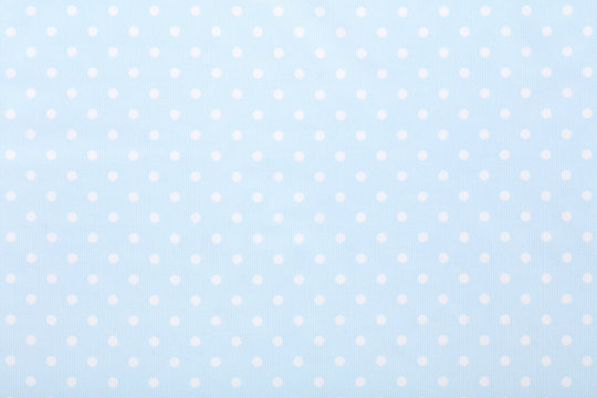 Baby blue polka dot fabric texture background
