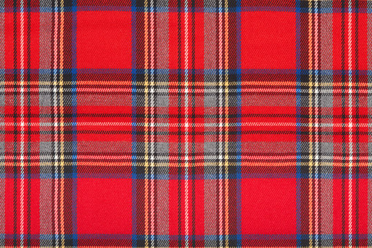 Red tartan, checkered scottish fabric macro, texture background