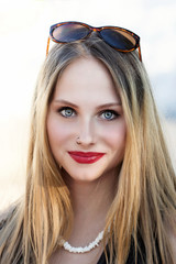 Blond girl with blue eyes portrait 4973