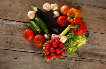 Fresh vegetables on a clean wooden table