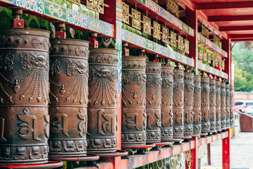 Tibetan prayer wheels at the famous Kumbum Monastery in Qinghai Province, China 