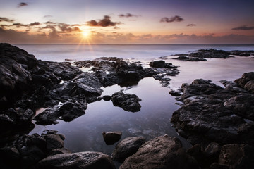 Fototapeta na wymiar Calm sunset over the Atlantic Ocean, Lanzarote, Playa Blanca