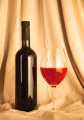 bottle of wine and glass on the table