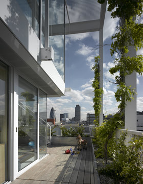 Toy horse on terrace of Roof Garden Apartment, London, UK.
