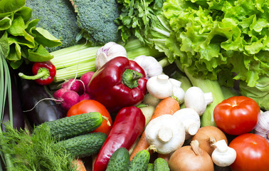 Background of fresh vegetables and greens closeup 