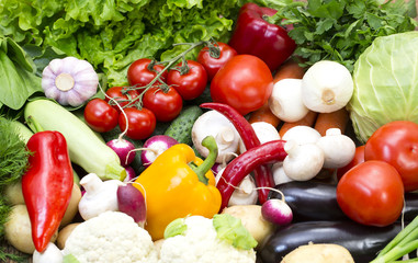 Background of fresh vegetables and greens closeup 