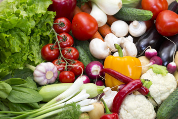 Background of fresh vegetables and greens closeup 