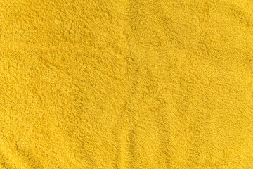 Close up yellow fleece texture. Background