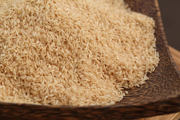 Coarse rice or half polished rice background, uncooked raw cerea
