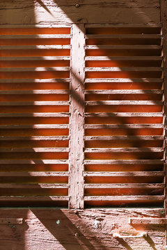 Detail of traditional French window shutters in Aix-en-Provence, France.