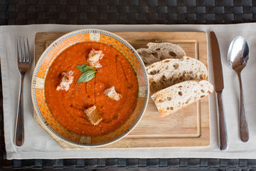 Gazpacho on wooden board top view