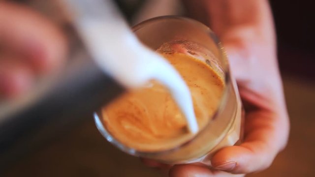 Making Latte art coffee. Closeup