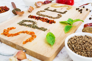 Different spices on white background