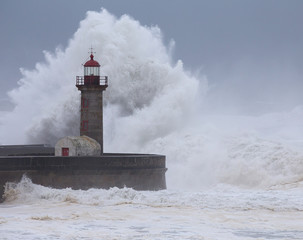 Two Big Waves Over the "Felgueiras" Lighthouse in Oporto, Portugal