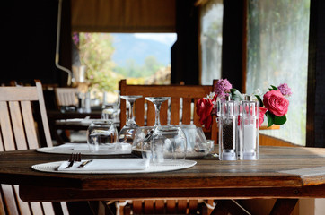 Served table in the empty eatery