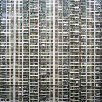 Facade of a gigantic housing project in downtown Shanghai, China.