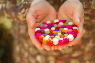 colorful handmade fabric and colorful wool .
