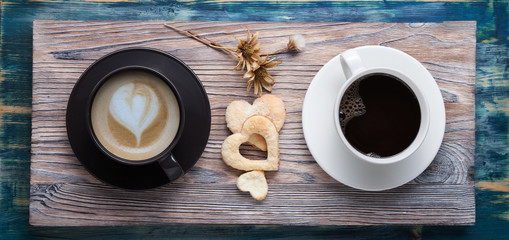 two cup of espresso and cappuccino on the table in a vintage Val