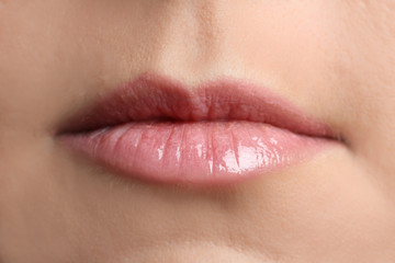 Makeup of a female lips. Close up