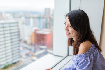 Woman looking at the city