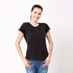 Obraz premium T-shirt design and people concept - close up of young woman in blank white t-shirt. Clean shirt mock up for design