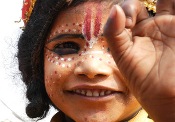 Indian kid dressing like God Shiva in Varanasi, India