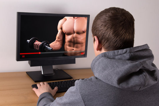 man watching sport training online at home