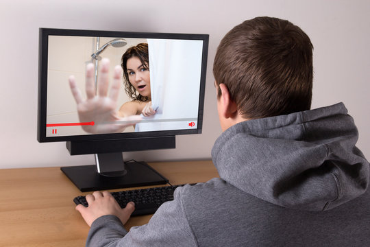 april fool's day concept - man watching video prank