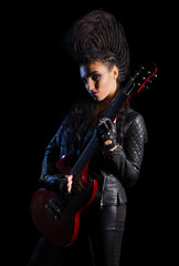 Obraz premium Young woman hard rock musician