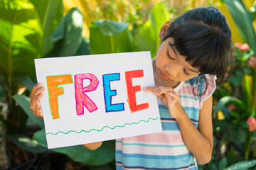free concept,girl holding free on white paper