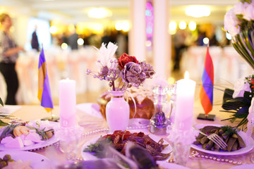 wedding holiday table with candles full of food
