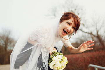 portrait of funny moments of newlywed  couple