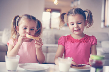 Girls eating breakfast.