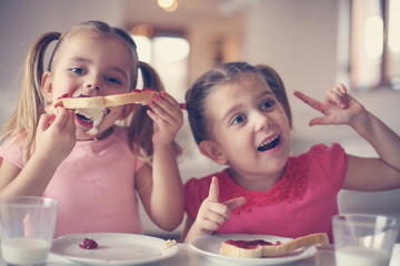 Girls eating breakfast.