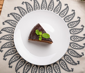 Piece of chocolate cake with caramel