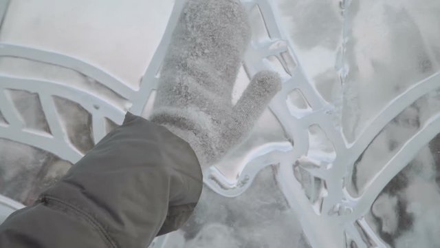 Young Woman Smiling At The Ice Sculptures, Winter Gloves Close Up