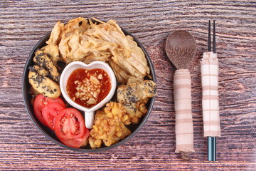 Deep fried dessert of corn ,taro ,nian gao and banana .