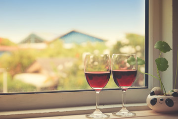 Still life of Wine glasses ,Roses and Rose petals,Greeting Card,Valentine's day,Background,Love Concept.