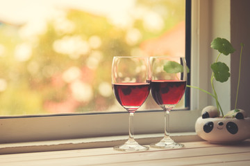 Still life of Wine glasses ,Roses and Rose petals,Greeting Card,Valentine's day,Background,Love Concept.