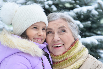 Fototapeta premium grandmother with granddaughter smiling