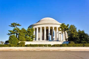 View of the southern-side of the shallow domed roof & circular Ionic colonnade of the Thomas Jefferson Memorial in West Potomac Park, Washington DC