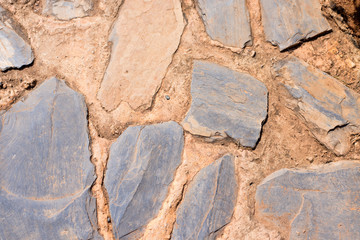 Rocks and soil on walk way