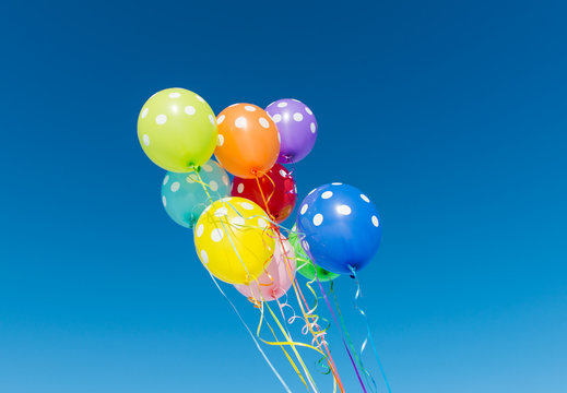 Balloons against the blue sky