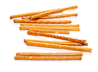 salty cracker pretzel sticks isolated on white background