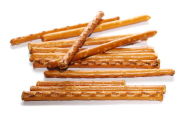 salty cracker pretzel sticks isolated on white background
