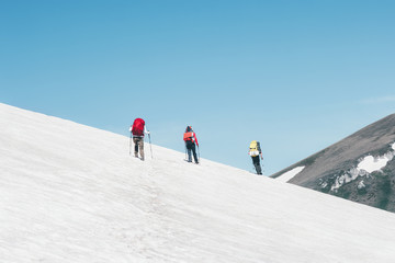 Fototapeta na wymiar Group Travelers climbing mountains glacier landscape Travel Lifestyle concept adventure extreme vacations outdoor sport recreation