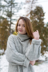 Funny Hipster Girl in Knitted Sweater