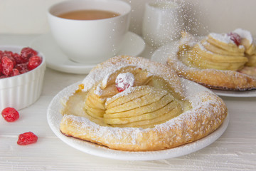 Puff pastry with apple and cherry trees.