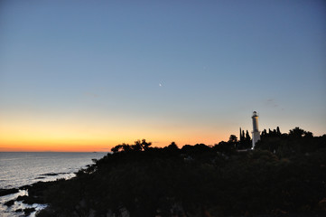 Fototapeta na wymiar sunset in Colonia del Sacramento, Uruguay, with lighthouse