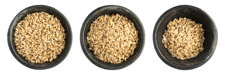 Raw Dry Oat Grain Grains Heap in Black Iron Bowl